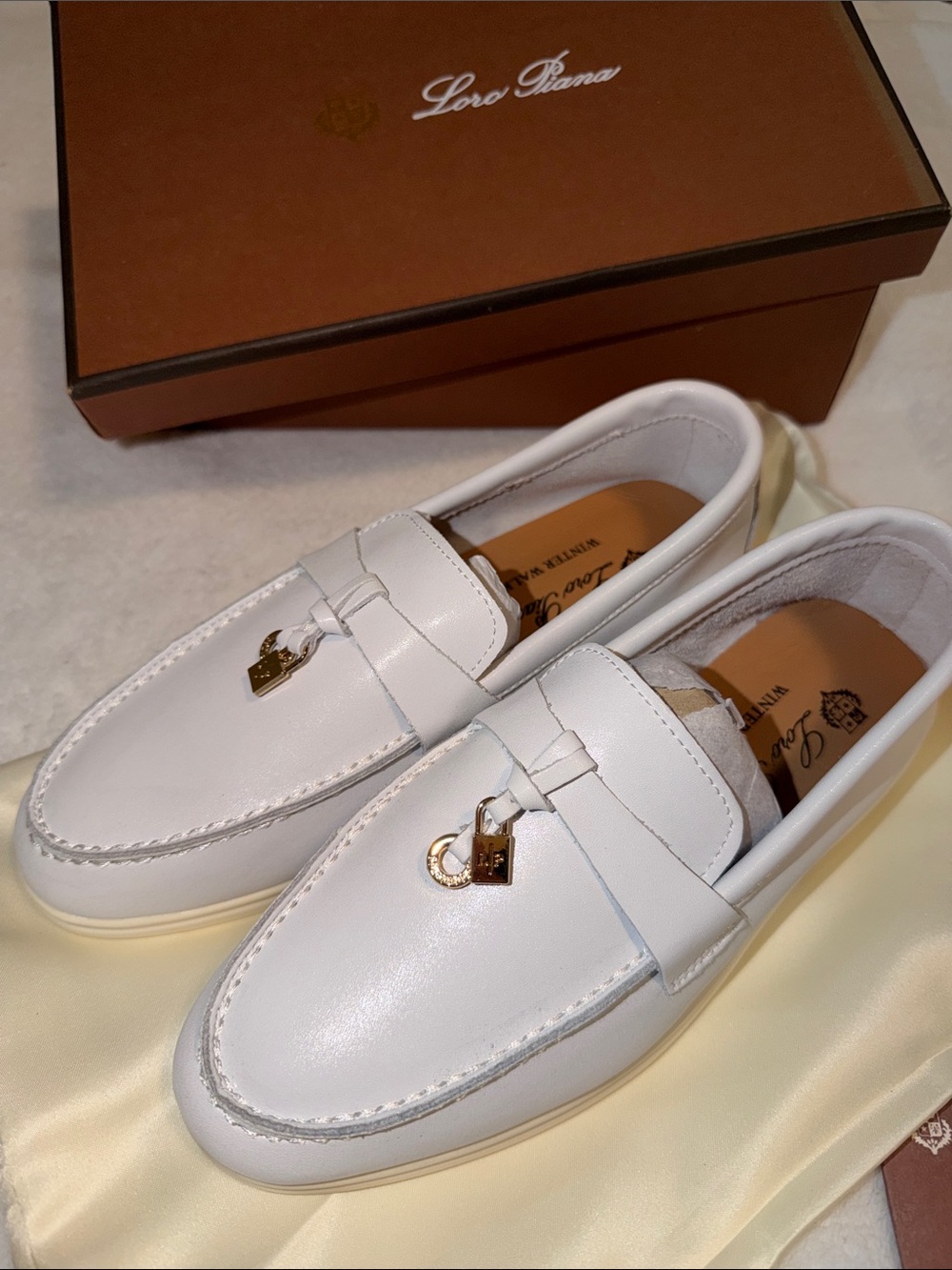 Loro Piana Men’s White Leather Penny Loafers with Silver Bit